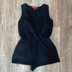 Saks Fifth Avenue black romper size small.  Gently worn / has pockets
